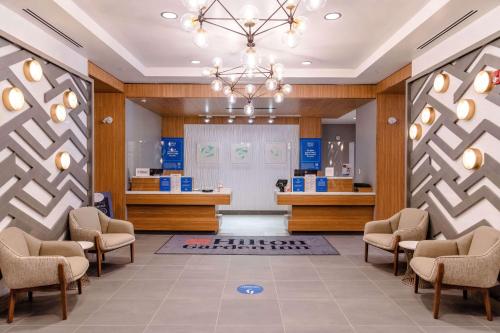 Лобби или стойка регистрации в Hilton Garden Inn Sudbury, Ontario, Canada
