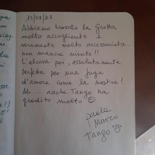 a page of a book with handwriting on it at La grotta in Fabrica di Roma