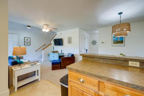 a kitchen and living room with a counter top at Near Ocean Buxton Townhome with Patio! in Buxton