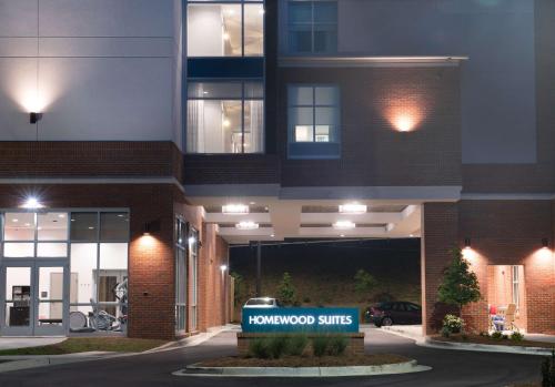 a building with a sign in front of it at Homewood Suites By Hilton North Charleston in Charleston