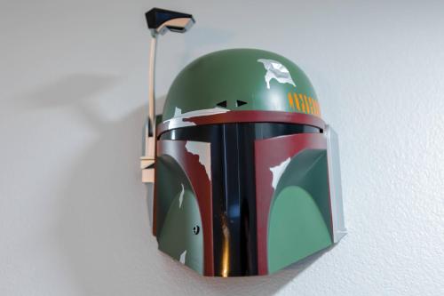 a helmet is hanging on a wall at Thematic House w PoolSpaGame Room in Resort in Loughman