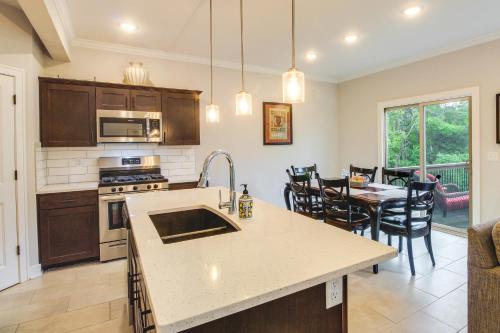 A kitchen or kitchenette at Parkville Vacation Rental Near Creekside Complex!