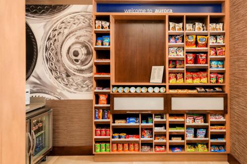 a store with a large inventory of food and merchandise at Hampton Inn & Suites Aurora South, Co in Aurora