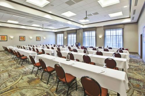 a large room with rows of tables and chairs at Embassy Suites Columbus - Airport in Columbus