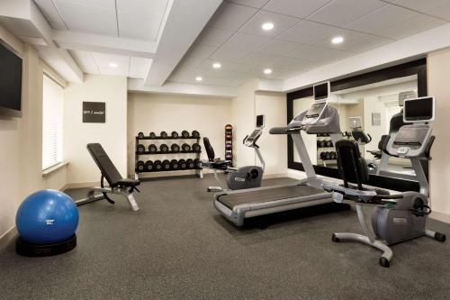 a gym with treadmills and exercise equipment in a room at Homewood Suites Williamsburg in Williamsburg