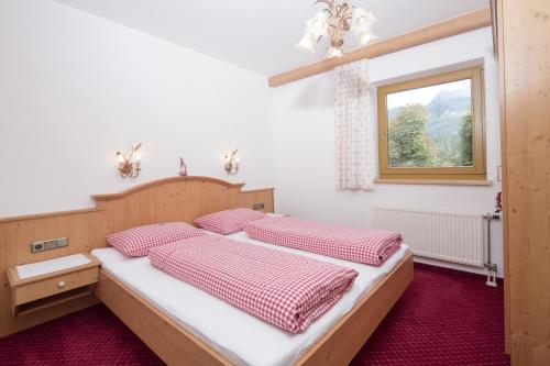 Posteľ alebo postele v izbe v ubytovaní Landhaus Greil