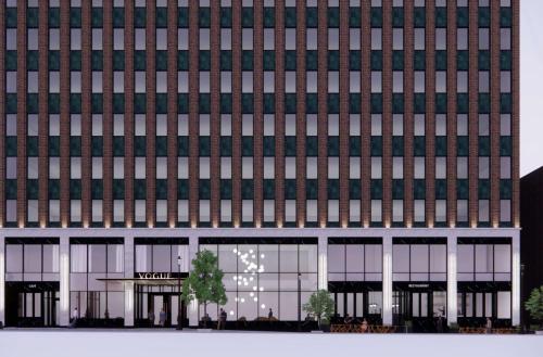 a rendering of the front of a building at Vogue Hotel Montreal Downtown, Curio Collection by Hilton in Montreal