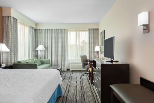Ένα ή περισσότερα κρεβάτια σε δωμάτιο στο Hampton Inn & Suites Mountain View