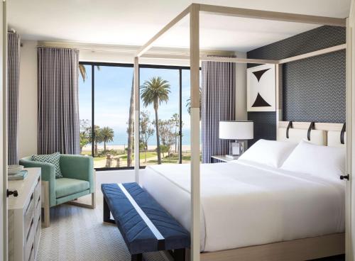 a hotel room with a large bed and a window at Oceana Santa Monica, LXR Hotels & Resorts in Los Angeles