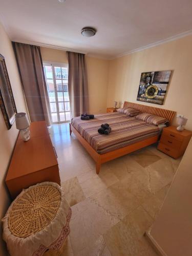 Säng eller sängar i ett rum på Apartamento en Callao Salvaje