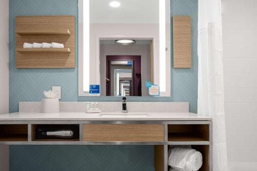 a bathroom with a sink and a mirror at Hilton Garden Inn Mt. Juliet, TN in Mount Juliet
