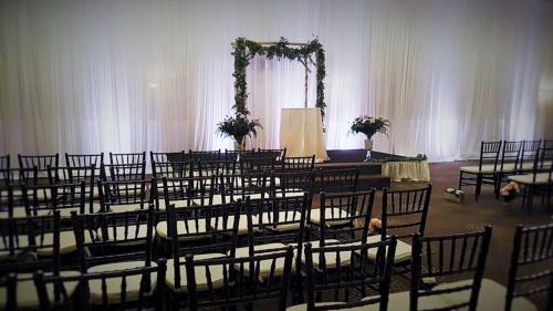 a room with a bunch of chairs and a altar at DoubleTree by Hilton Bloomington in Bloomington