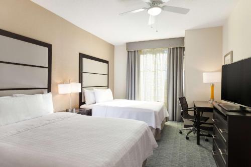 Ένα ή περισσότερα κρεβάτια σε δωμάτιο στο Homewood Suites by Hilton Frederick