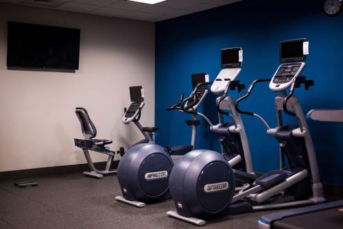 a gym with several cardio machines in a room at Hampton Inn & Suites Olympia Lacey, Wa in Olympia