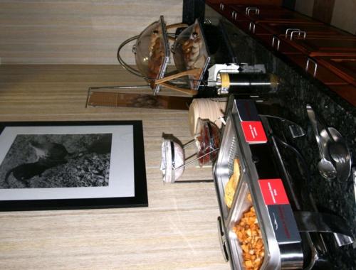 a picture of a cat on the floor next to a table at Hampton Inn & Suites Exmore - Eastern Shore in Exmore