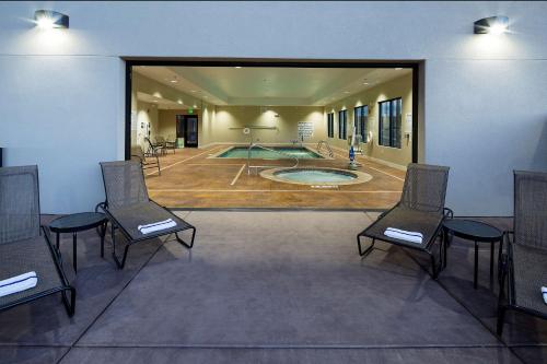 a large room with a pool in the middle of a building at Hampton Inn & Suites Page - Lake Powell in Page