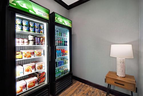 a refrigerator filled with lots of food and drinks at Homewood Suites - Doylestown in Warrington