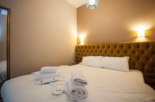 Postel nebo postele na pokoji v ubytování Newway Apartments
