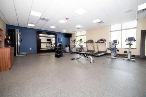 a gym with chairs and machines in a room at Hampton Inn Atlantic City/Absecon, NJ in Absecon