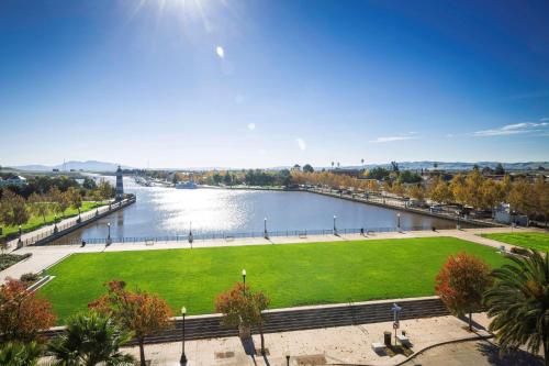 a view of a park with a river at Hampton Inn & Suites Suisun City Waterfront in Suisun City