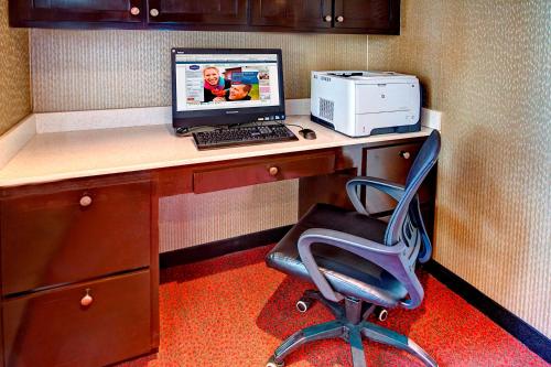 a desk with a computer and a printer on it at Hampton Inn Cookeville in Cookeville