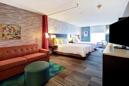 En eller flere senge i et værelse på Home2 Suites By Hilton Amherst Buffalo