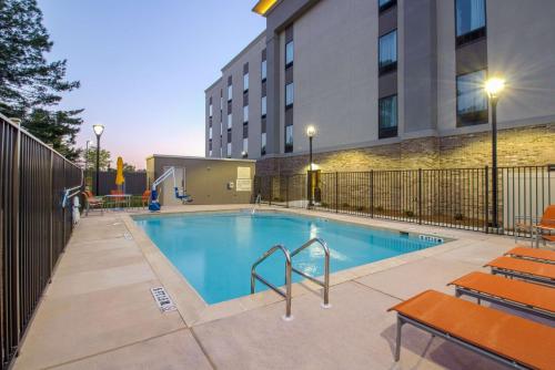 a swimming pool in front of a building at Hampton Inn Crestview South I-10, Fl in Crestview