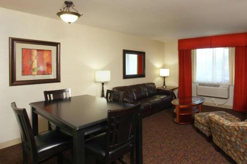 a living room with a couch and a table at Hampton Inn Richland-Tri Cities in Richland