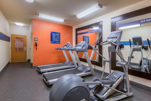 a gym with cardio equipment in a building at Hampton Inn San Marcos in San Marcos