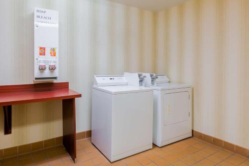 a white washer and dryer in a room at Hampton Inn San Marcos in San Marcos