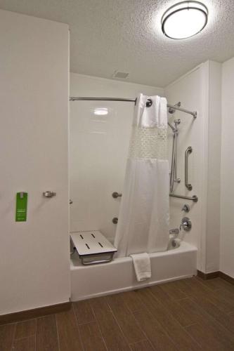a bathroom with a shower with a shower curtain at Hampton Inn & Suites Chillicothe in Chillicothe