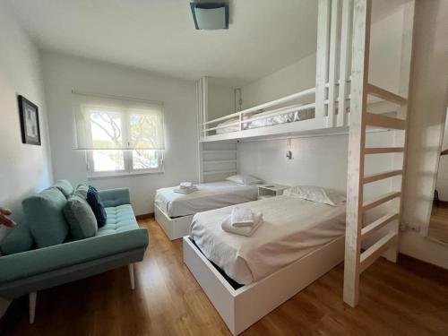 Ένα ή περισσότερα κρεβάτια σε δωμάτιο στο CASA DOS CATOS