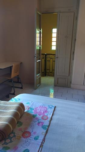 a bedroom with a bed with a rug on the floor at Isla Francia in Asuncion