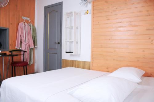 Кровать или кровати в номере Mamba Hotel