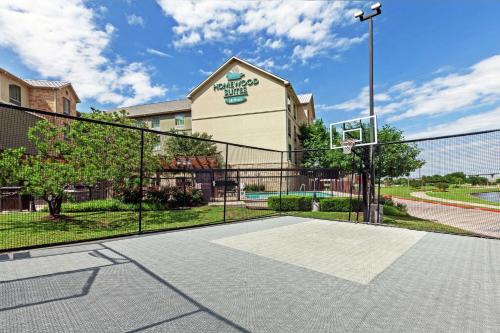 a basketball court in front of a building at Homewood Suites by Hilton Waco in Waco