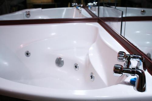 Ванная комната в Mamba Hotel