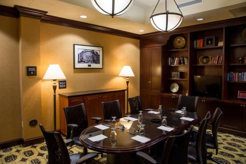 a conference room with a table and chairs at Hampton Inn & Suites Albany-Downtown in Albany