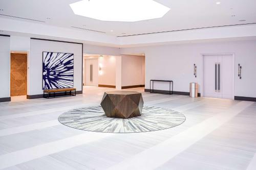 a large room with a table in the middle at DoubleTree by Hilton Hotel Miami Airport & Convention Center in Miami