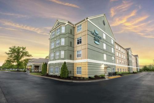 a rendering of the front of a hotel at Homewood Suites by Hilton at Carolina Point - Greenville in Greenville