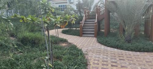 Un jardín fuera de Al Maha Farm