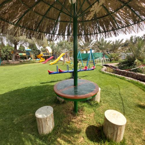 Zona de juegos infantil en Al Maha Farm