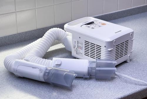 a air conditioner on the floor in a bathroom at AOI Sauna SPA & Dog Villa HAKODATE in Hakodate