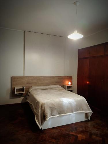 En eller flere senger på et rom på Mendoza - Bed & Brunch