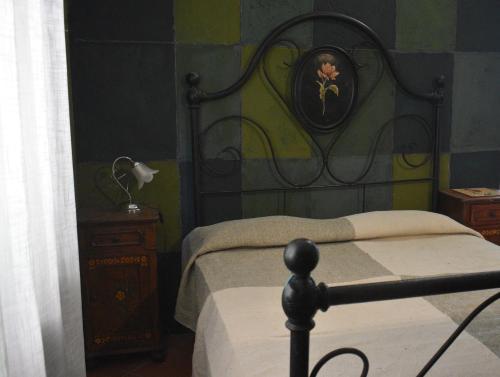 Giường trong phòng chung tại Cottage Oasi di San Martino