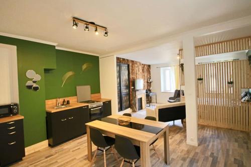 Kuchyň nebo kuchyňský kout v ubytování Appartement cosy hyper centre