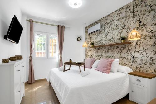 Ένα ή περισσότερα κρεβάτια σε δωμάτιο στο Preciosa Denia