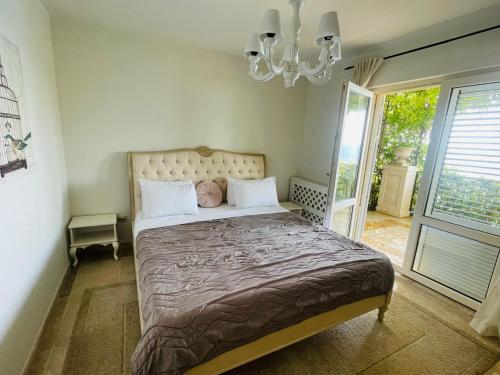 Postel nebo postele na pokoji v ubytování Apartments St Stefan