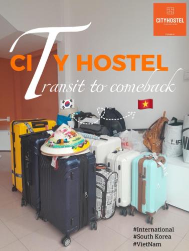 a bunch of suitcases are lined up in a room at City Hostel Da Nang in Da Nang