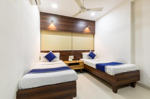 Hotel Kalingaにあるベッド