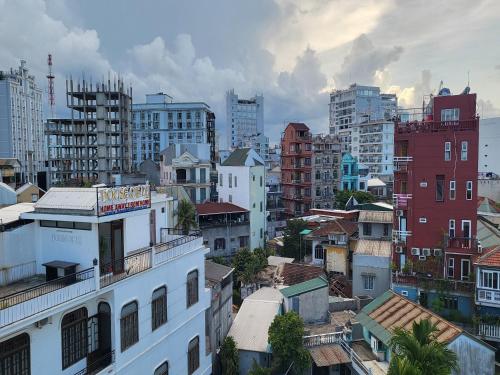 a view of a city with tall buildings at Amy Hotel & Apart' Hue in Hue